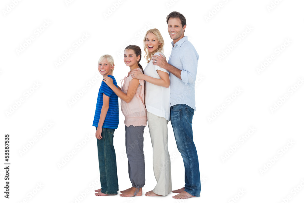 Family posing together and looking at camera