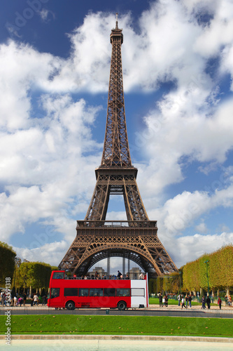 Eiffel Tower with red bus in Paris, France #53591318