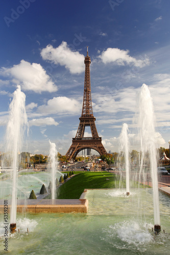 Eiffel Tower with city fountains in Paris, France