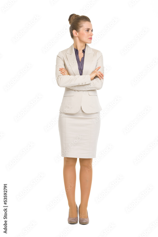 Full length portrait of business woman looking on copy space