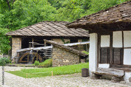 Water mill, an old house and wooden bench in Etara, Bulgaria