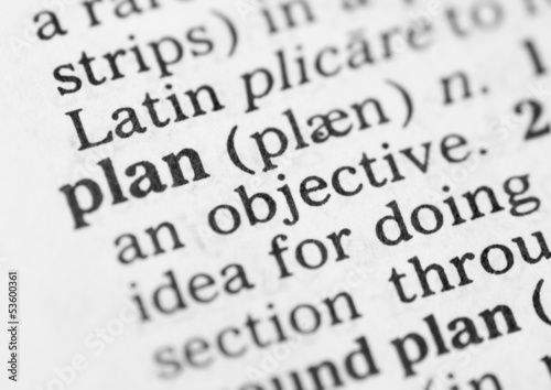 Macro image of dictionary definition of plan