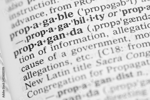 Macro image of dictionary definition of propaganda