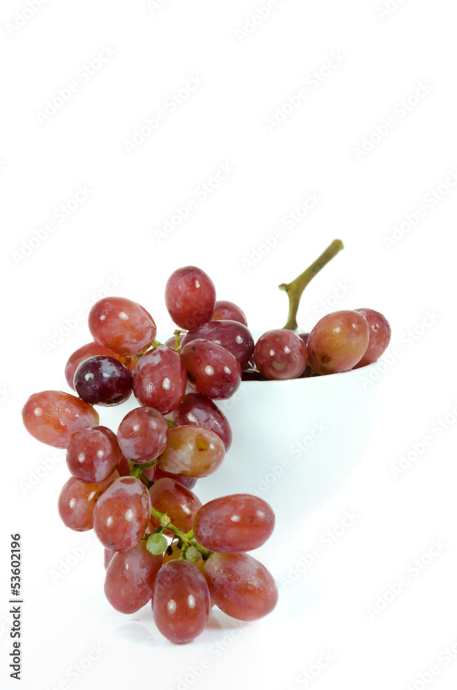  red grapes in white bowl