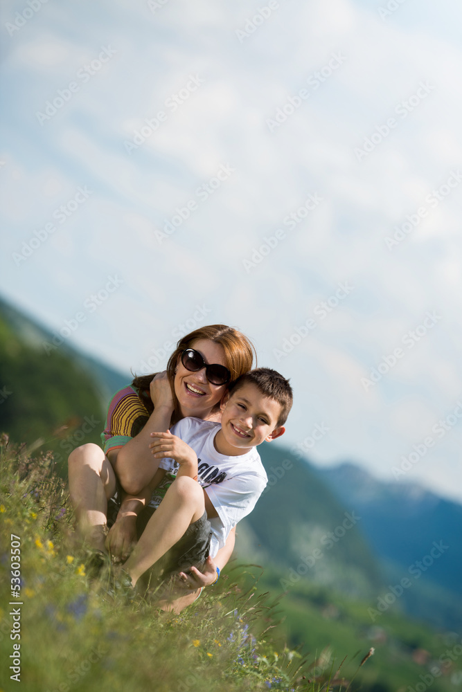 mother with son sitting and spreading love mother with son sitting and spreading love