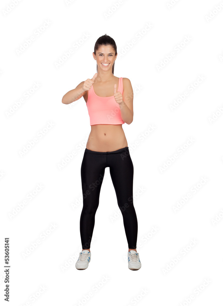 Attractive girl with sports clothes saying Ok Attractive girl with sports clothes saying Ok