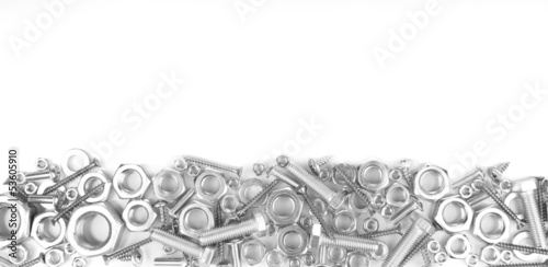 Bolts, screws, nuts isolated on white photo