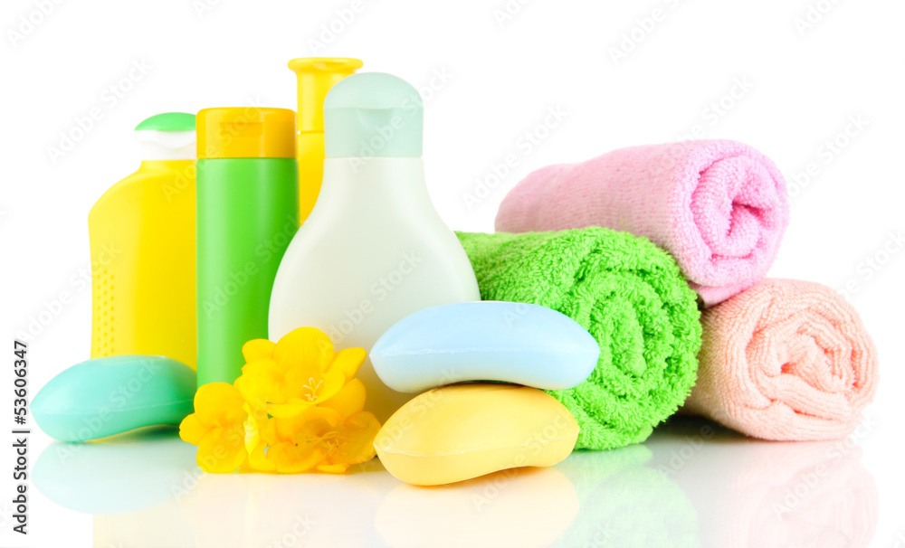Baby cosmetics, towels and soap, isolated on white