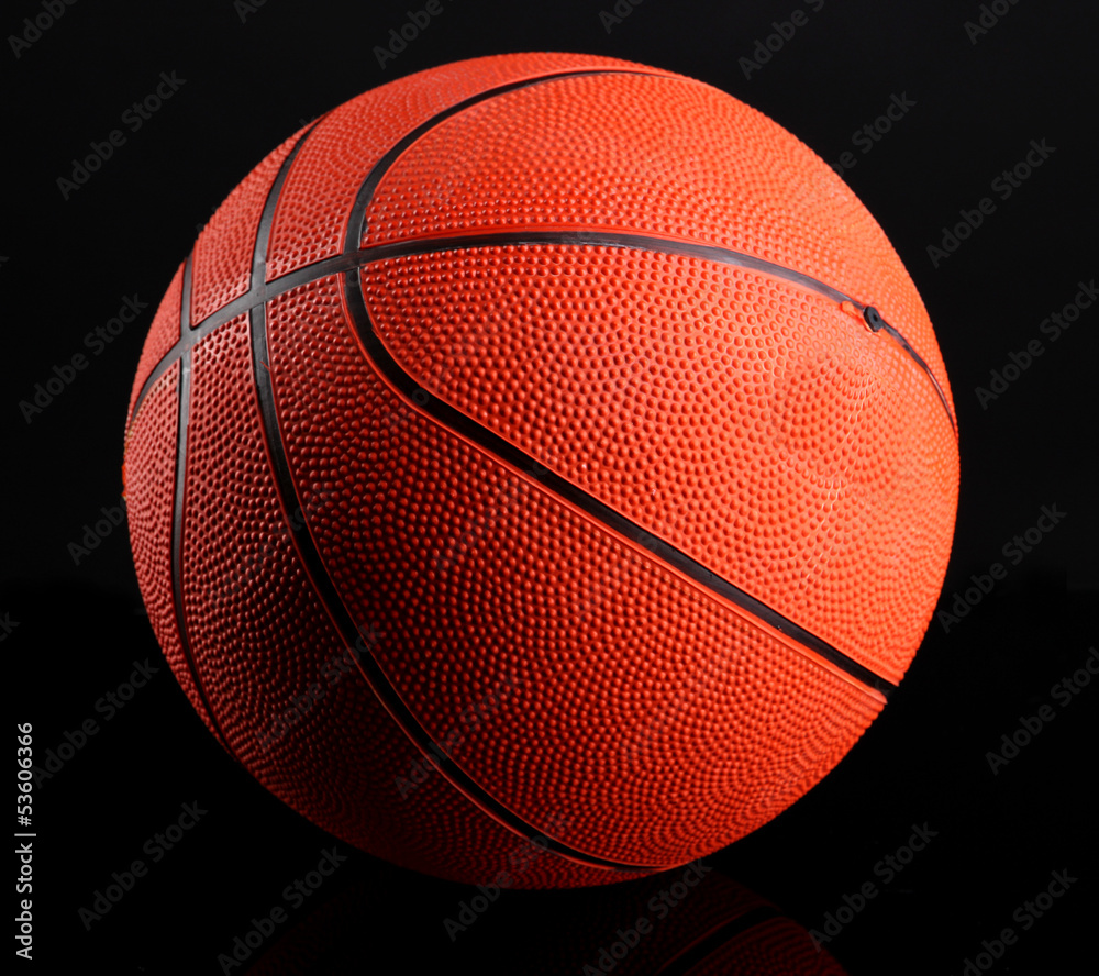 Fototapeta premium Basketball on black background
