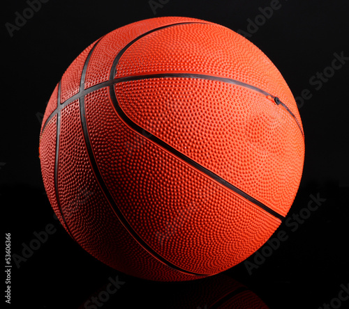 Basketball on black background © Africa Studio