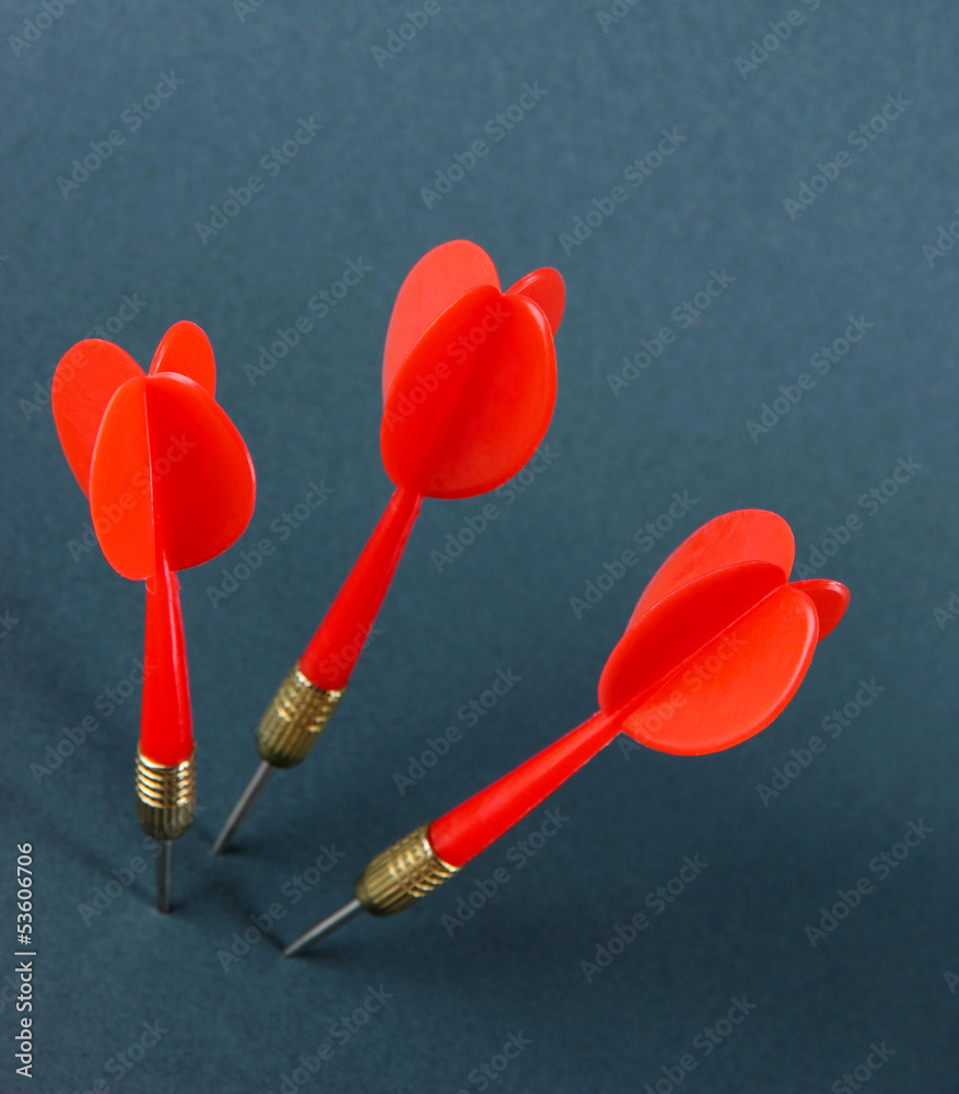 Darts on gray background