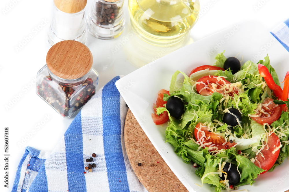 Light salad on plate on napkin