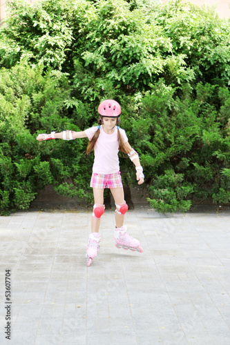 Little girl in roller skate...