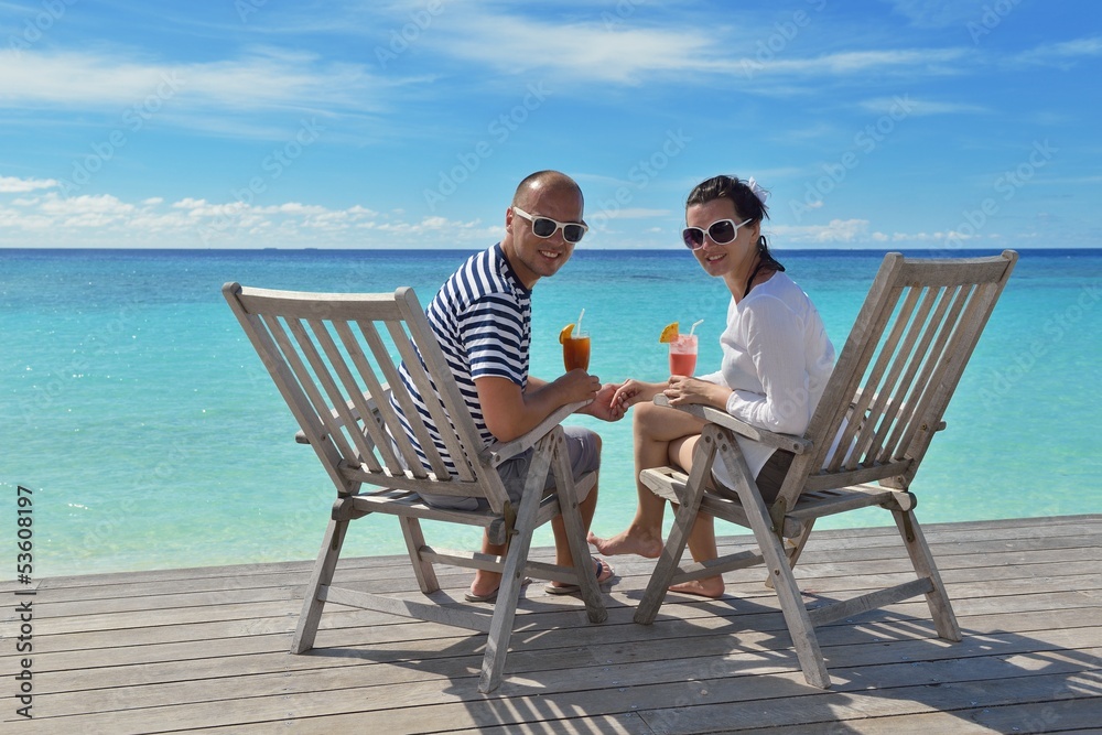 happy young couple relax and take fresh drink