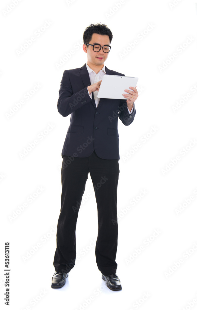asian business male using tablet on isolated white background, f asian business male using tablet on isolated white background, f