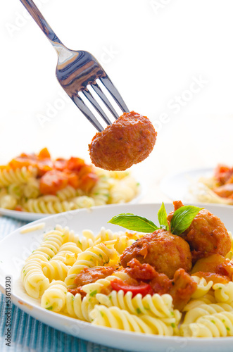 Italian pasta with sauce and parmesan cheese