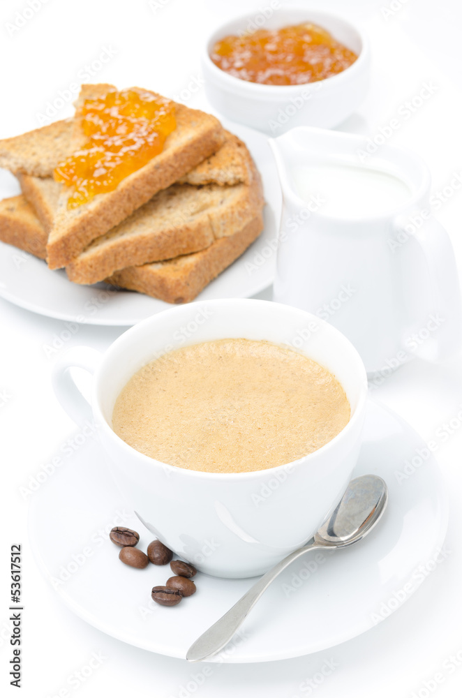 cup of cappuccino, milk and fresh toast with jam on white