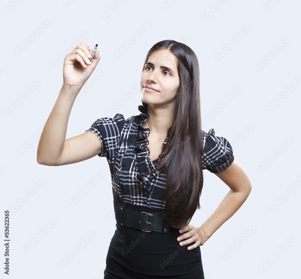 Obraz premium Happy smiling cheerful young business woman writing or drawing o