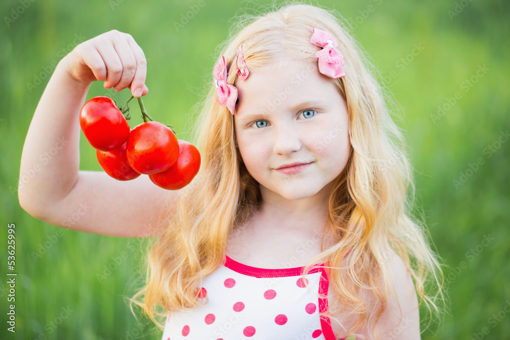 smile girl with tomatoes