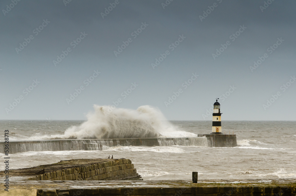 Seaham lighthouse with crashing waves