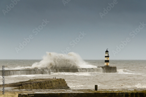 Seaham lighthouse with crashing waves