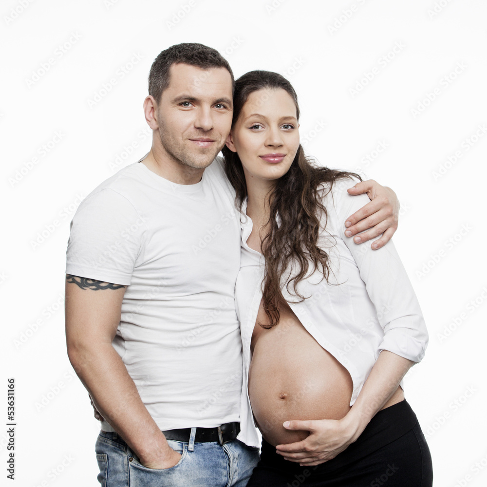Pregnant couple isolated on white background