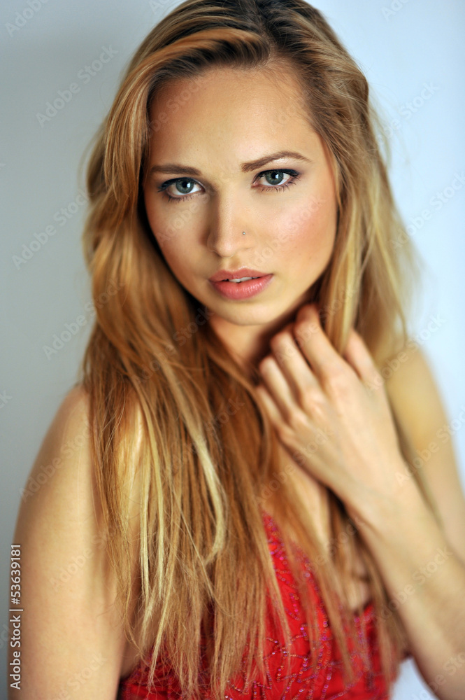 Naklejka premium Closeup portrait of young blond model