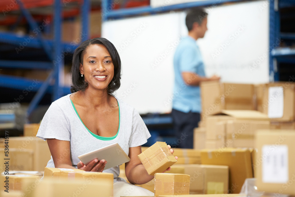 Workers In Warehouse Preparing Goods For Dispatch Workers In Warehouse Preparing Goods For Dispatch