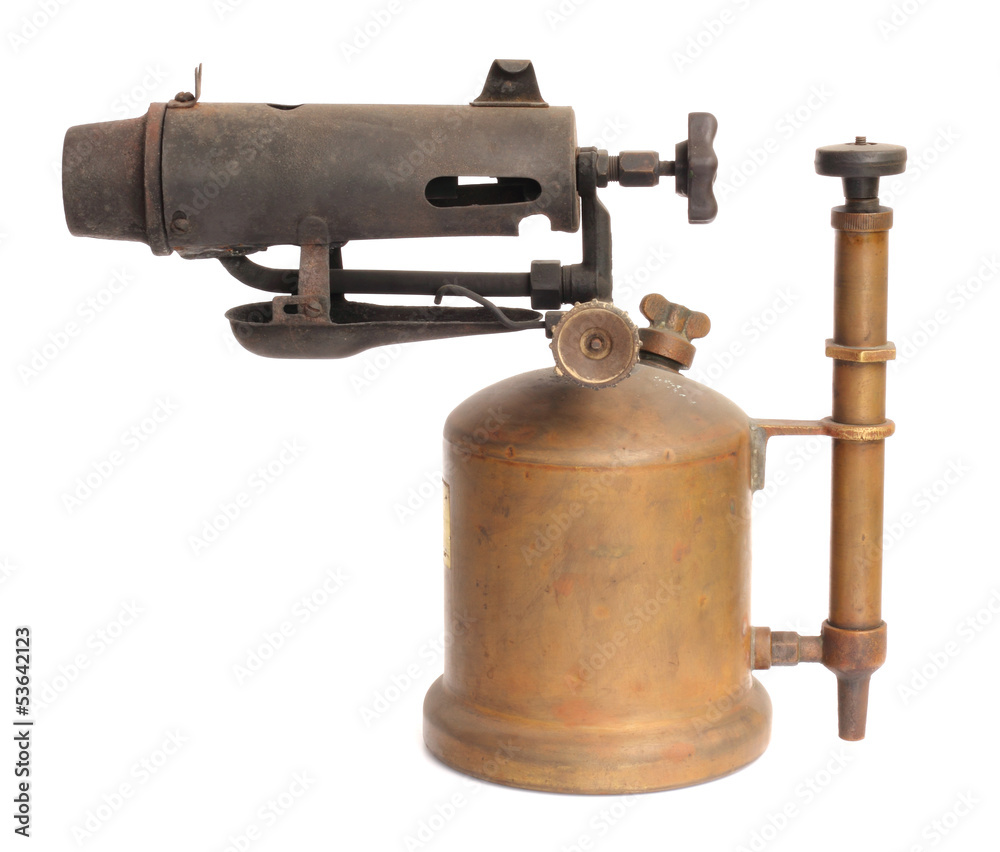 antique blowtorch isolated on white background antique blowtorch isolated on white background
