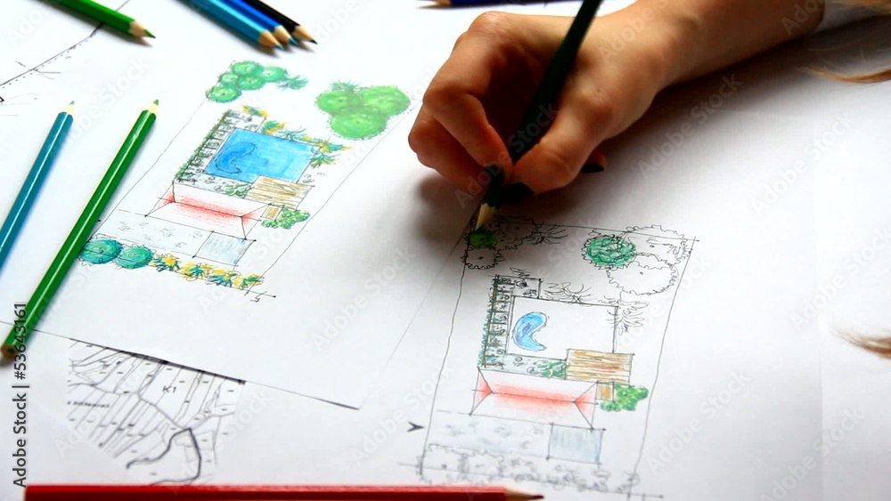 Woman landscape architect at work. Woman landscape architect at work.