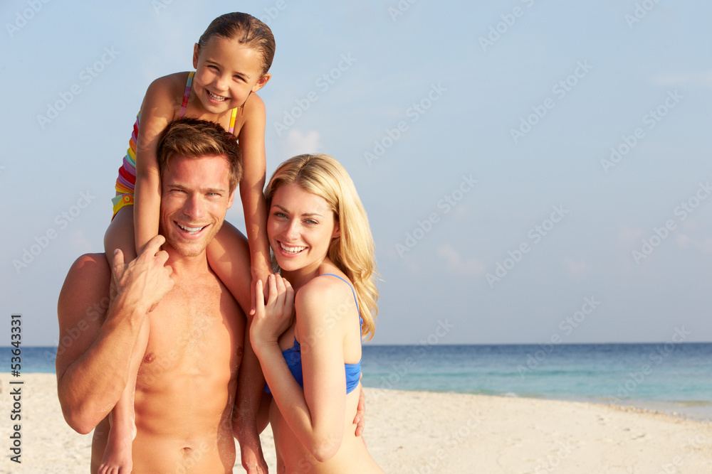 Portrait Of Family On Tropical Beach Holiday