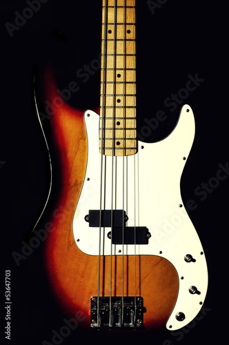 bass guitar on a black background