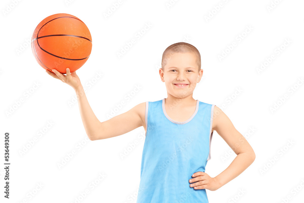 Smiling child holding a basketball Smiling child holding a basketball
