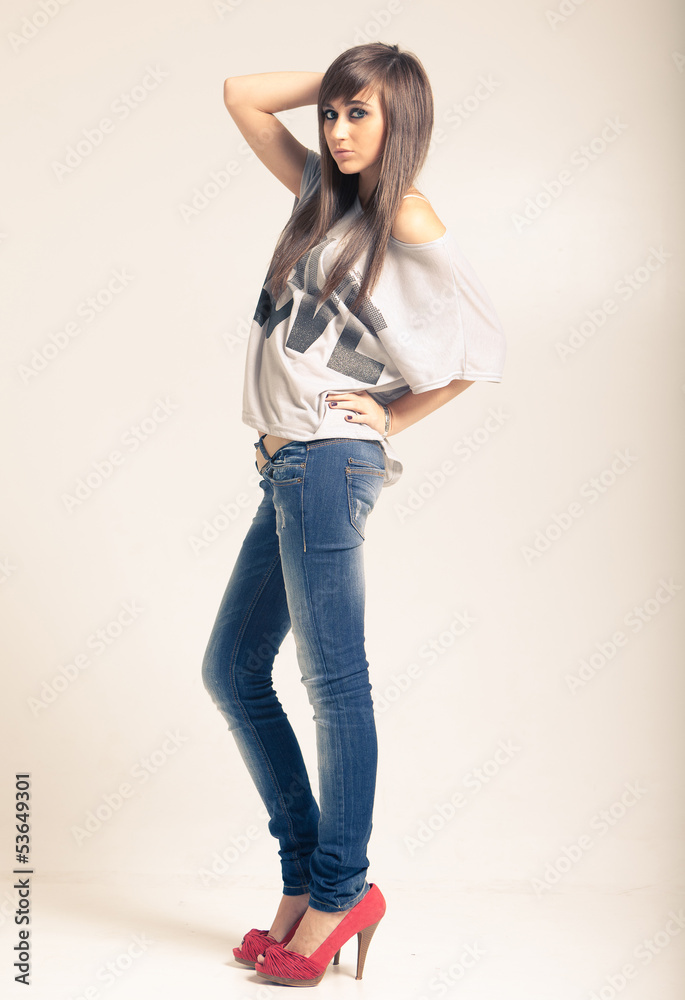 woman wearing jeans and t-shirt with an inscription love woman wearing jeans and t-shirt with an inscription love