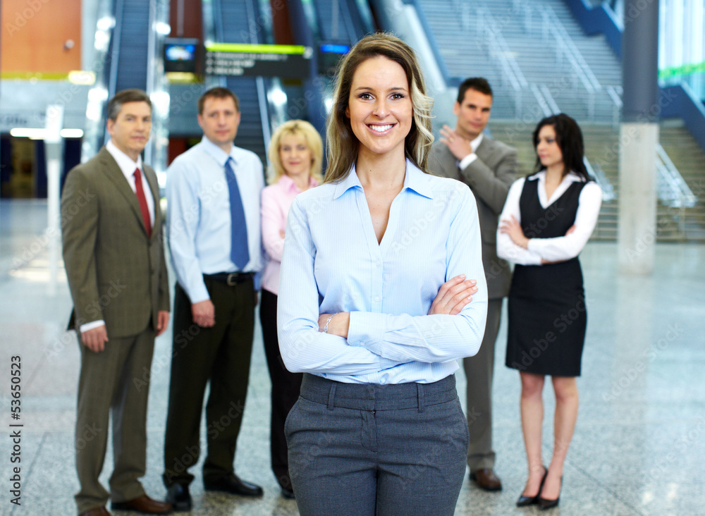 Business woman and a group of workers. Business woman and a group of workers.
