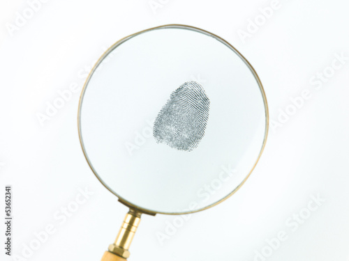 Tableau sur toile fingerprint through magnifying glass