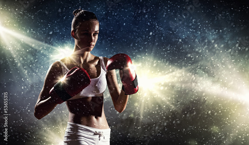 Young boxer woman © Sergey Nivens