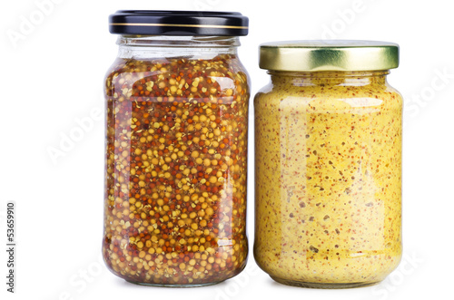 Glass jars with mustard