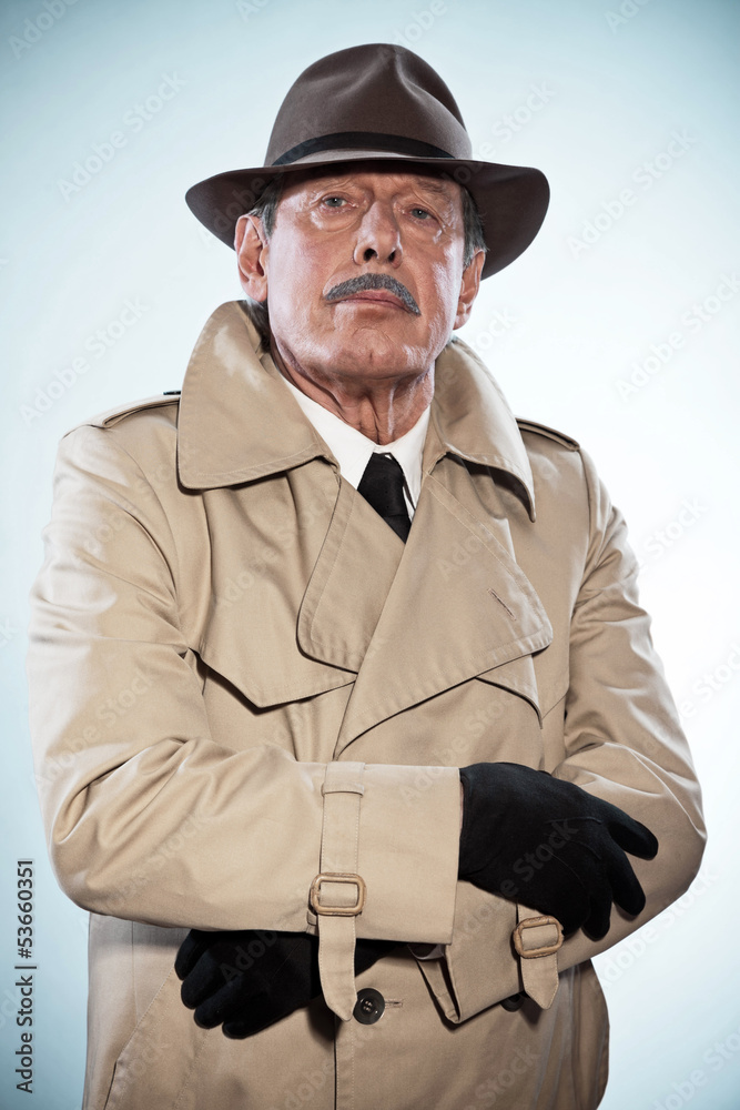 Retro detective man with mustache and hat. Wearing raincoat. Stu Retro detective man with mustache and hat. Wearing raincoat. Stu