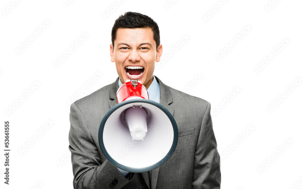 Crazy Asian businessman screaming in megaphone on white backgrou Crazy Asian businessman screaming in megaphone on white backgrou