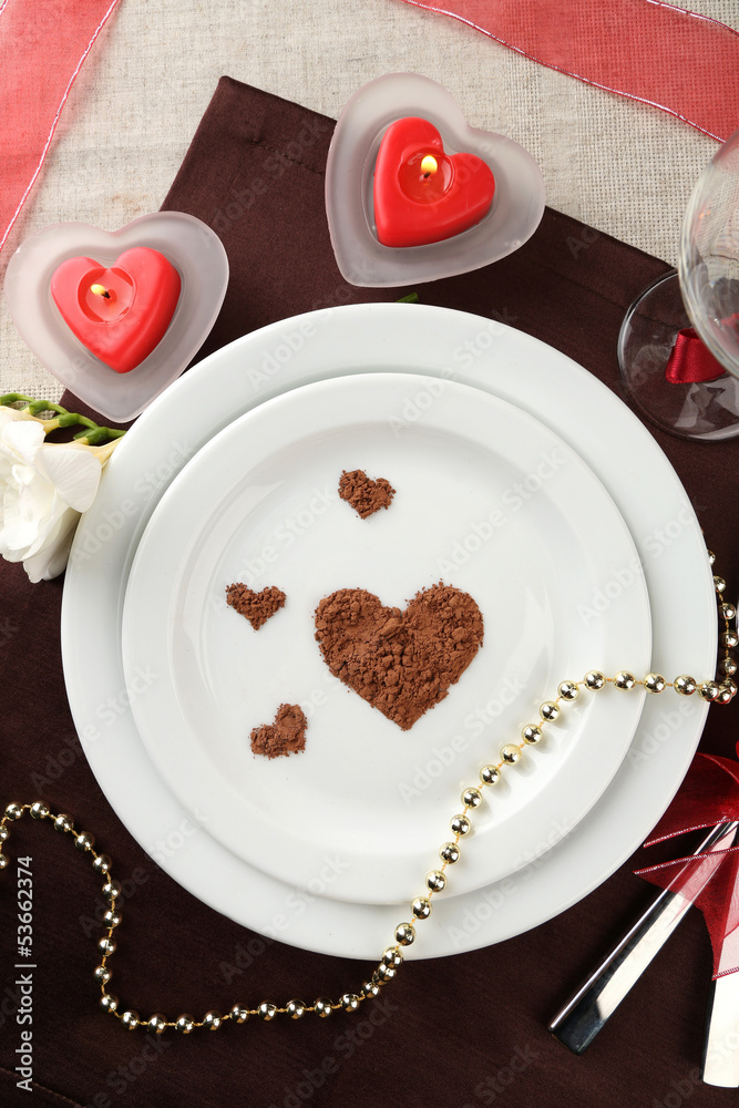 Table setting in honor of Valentine's Day close-up Table setting in honor of Valentine's Day close-up