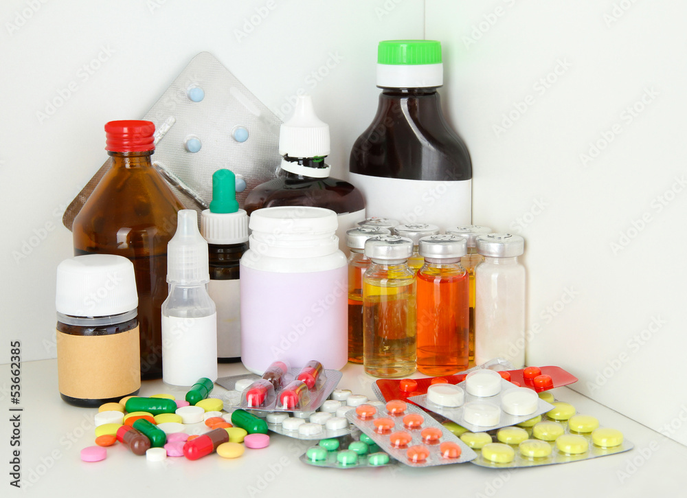 Medical bottles and pills on shelf Medical bottles and pills on shelf