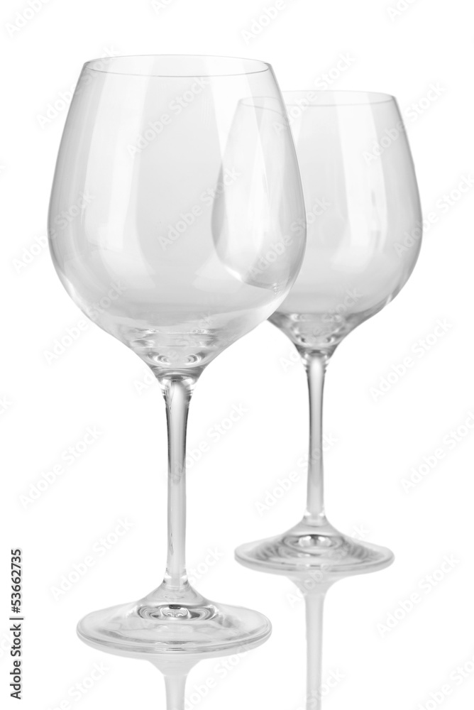 Empty wine glasses isolated on white