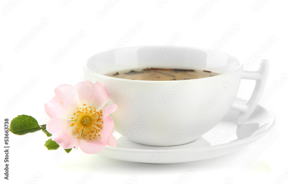 Cup of herbal tea with hip rose flowers, isolated on white Cup of herbal tea with hip rose flowers, isolated on white