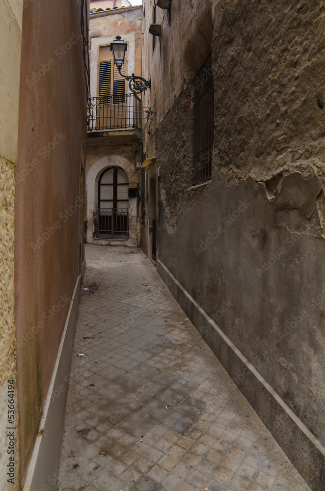 Narrow street in Syracuse, Sicily, Italy