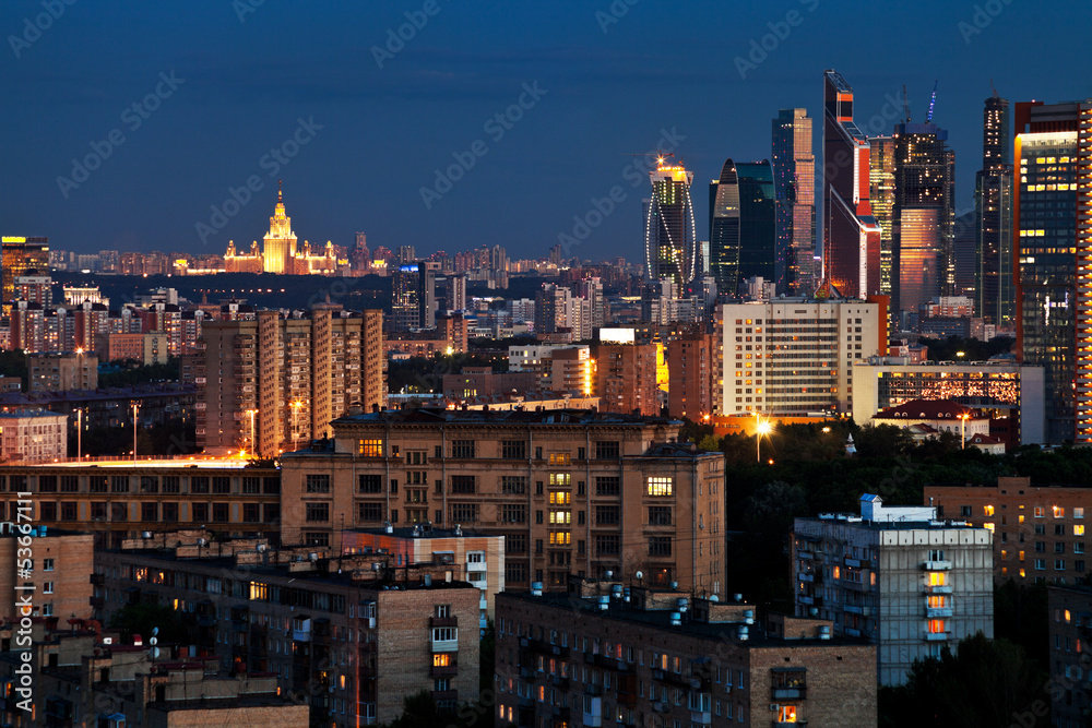 urban panorama in blue summer night