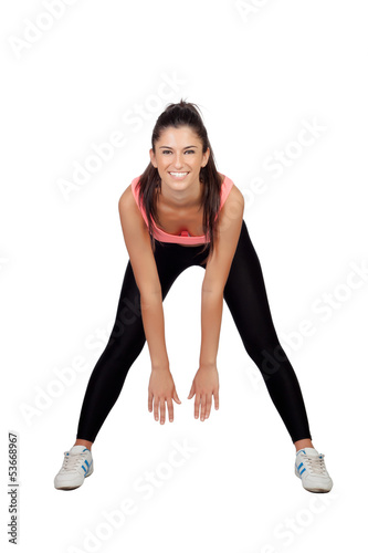 Pretty woman doing stretching into her workout