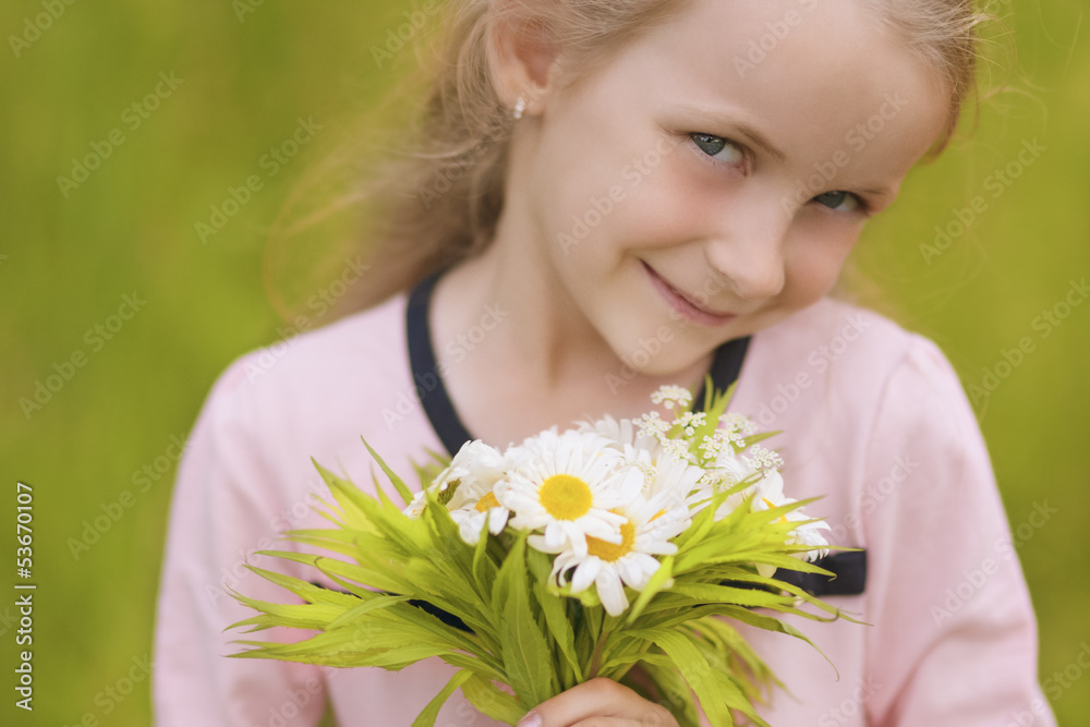 closeup portrait of little caucasian girl holding flowers bouque closeup portrait of little caucasian girl holding flowers bouque