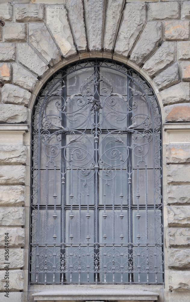 An old church window showing much detail and texture An old church window showing much detail and texture