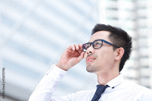 Portrait of young business man of Asian